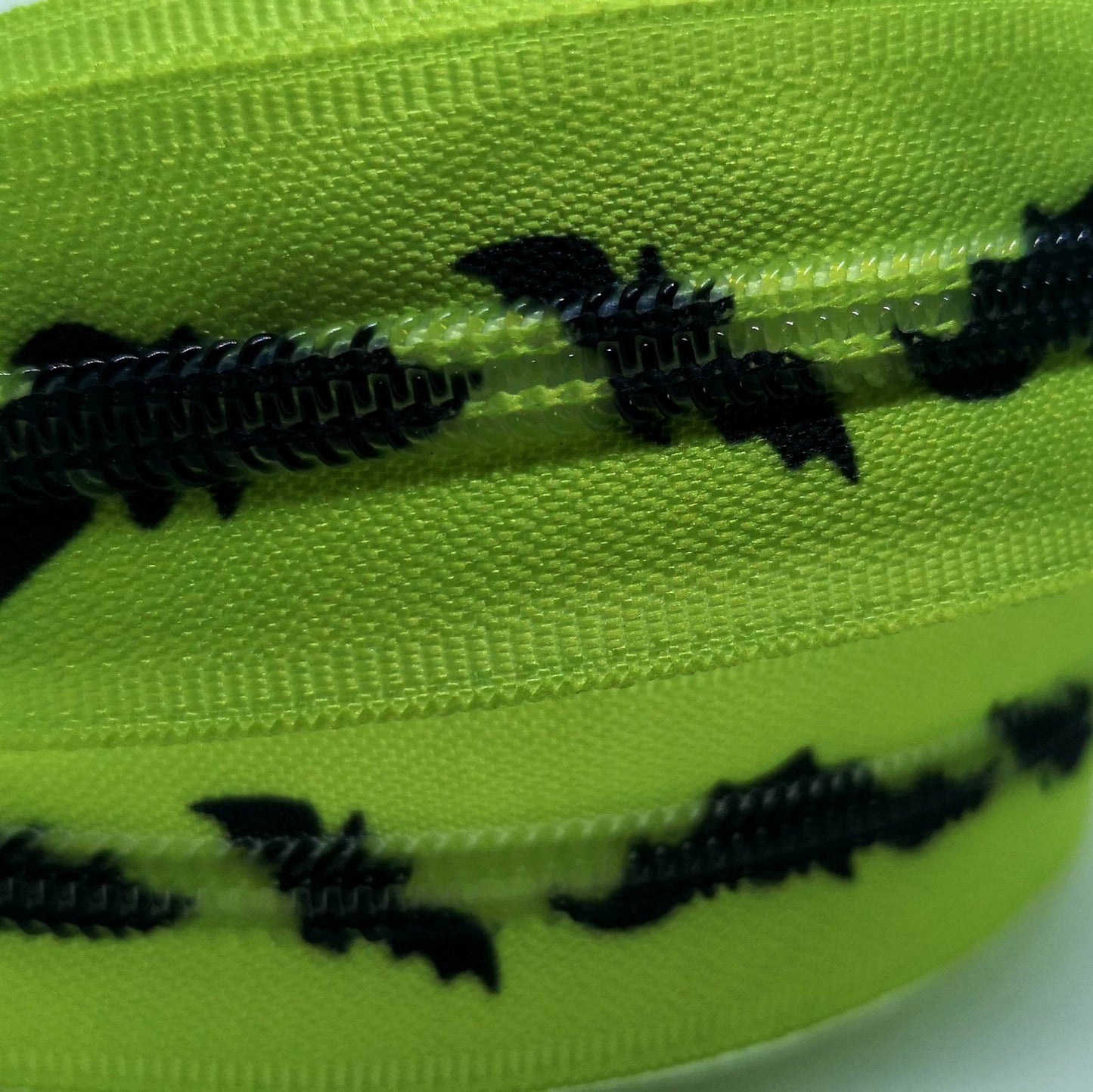 Green Bats Zipper Sold by the meter