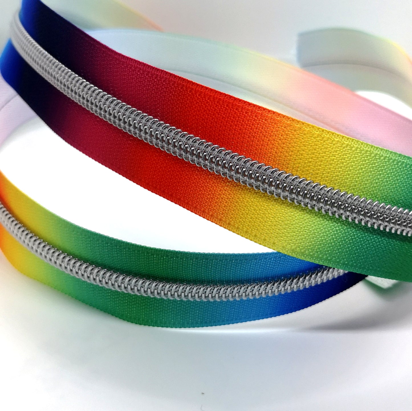 Bright Rainbow with silver teeth zipper tape