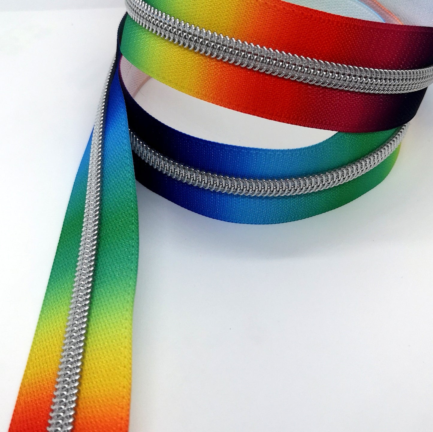 Bright Rainbow with silver teeth zipper tape