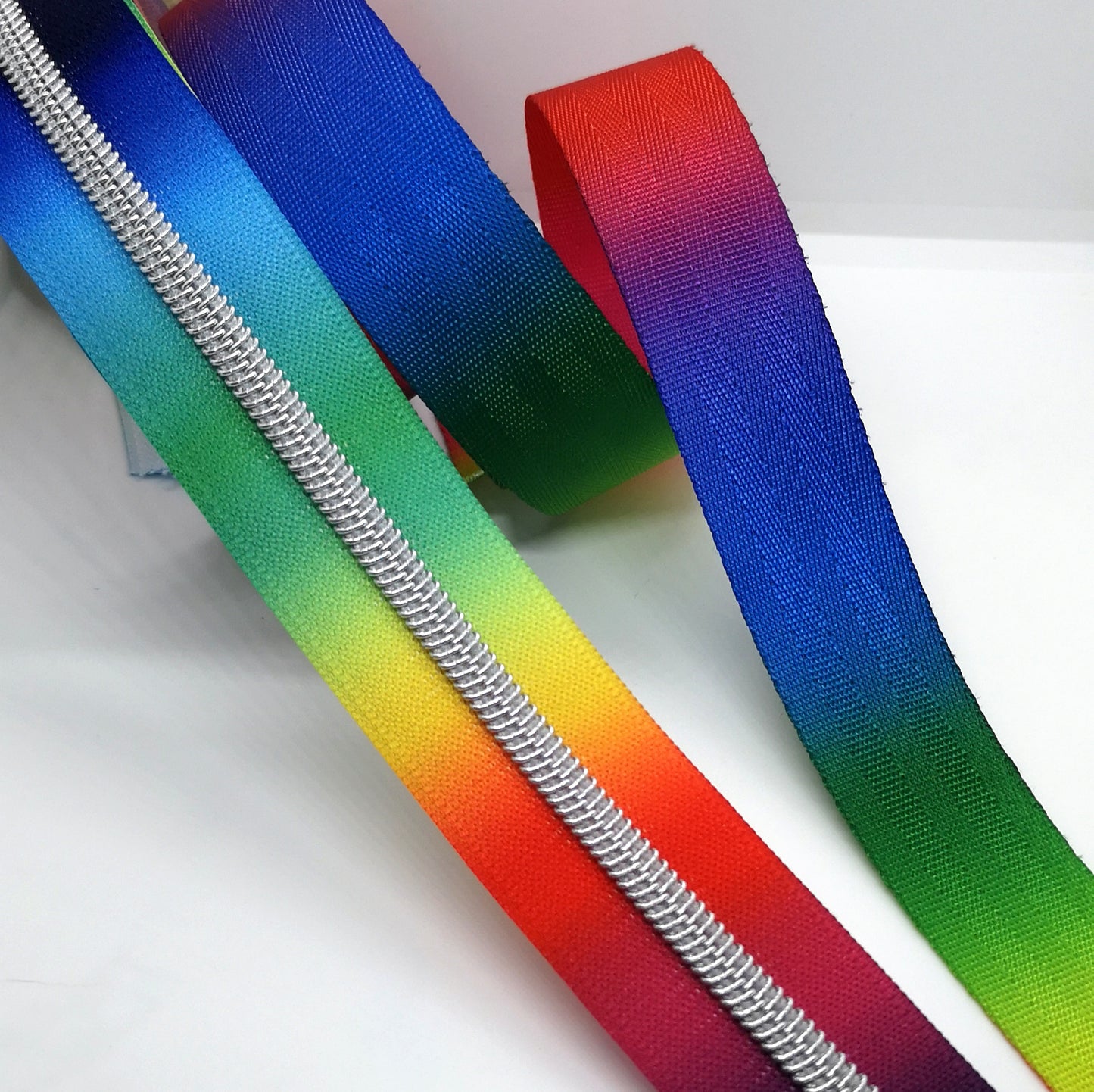 Bright Rainbow with silver teeth zipper tape