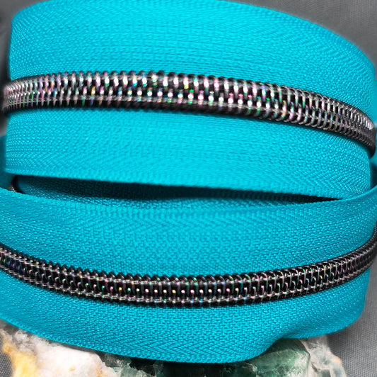 Dark Galaxy Teeth on Turquoise Zipper Tape